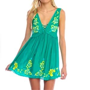 Free People Green Dress with yellow and blue flowers. Size S